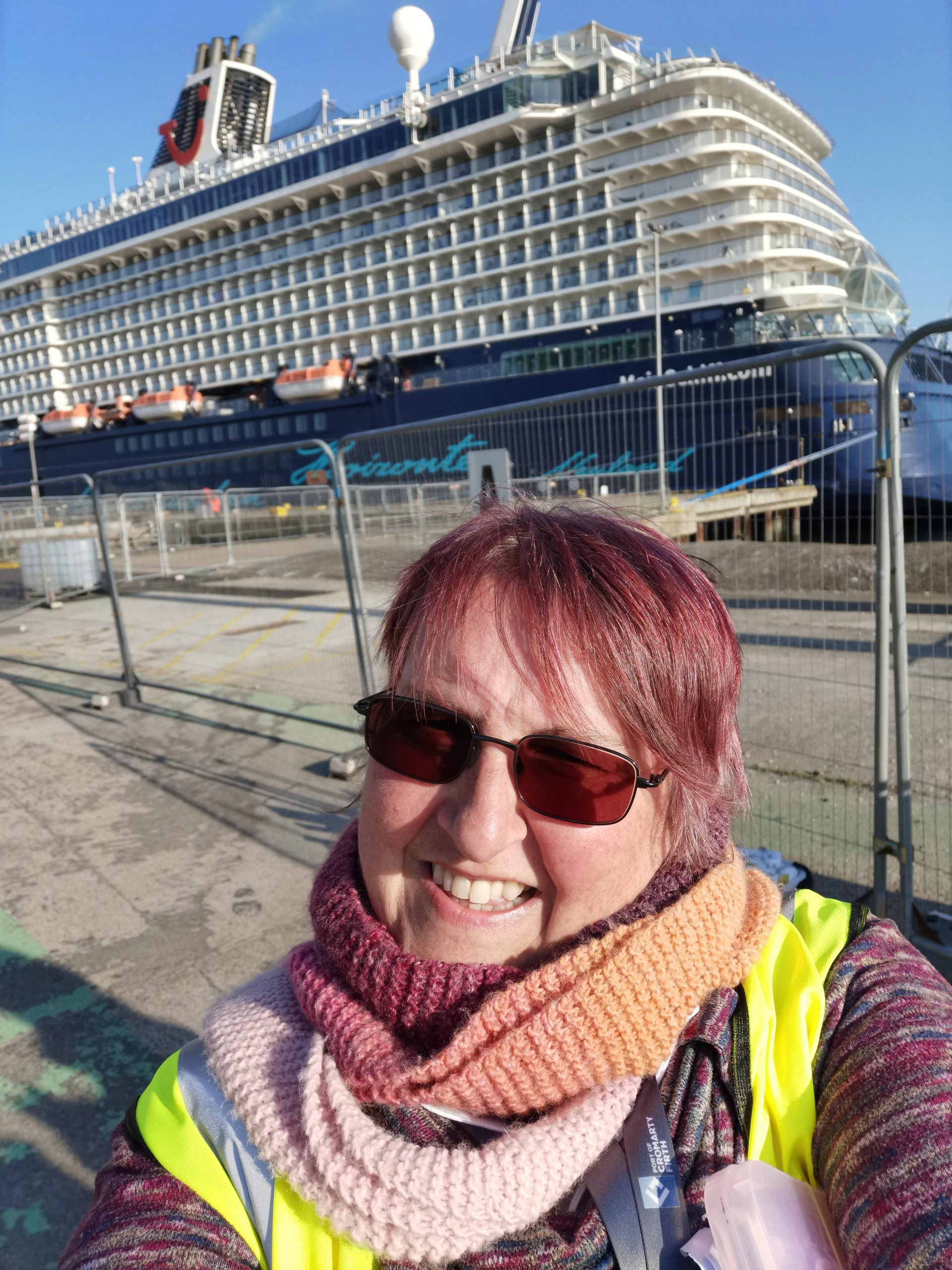 photo of melanie with cruise ship in the background